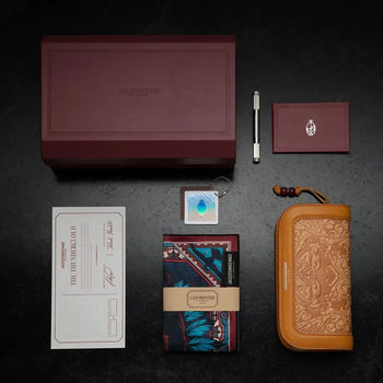 acques Marie Mage Last Frontier V handcrafted Japanese sunglasses packaging set with monograph box, embossed leather case, cleaning cloth, screwdriver, and authenticity card