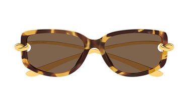 Sunglasses with tortoiseshell frame and brown lenses on a white background